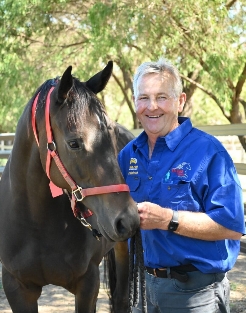 Dr Chris Gales with a horse
