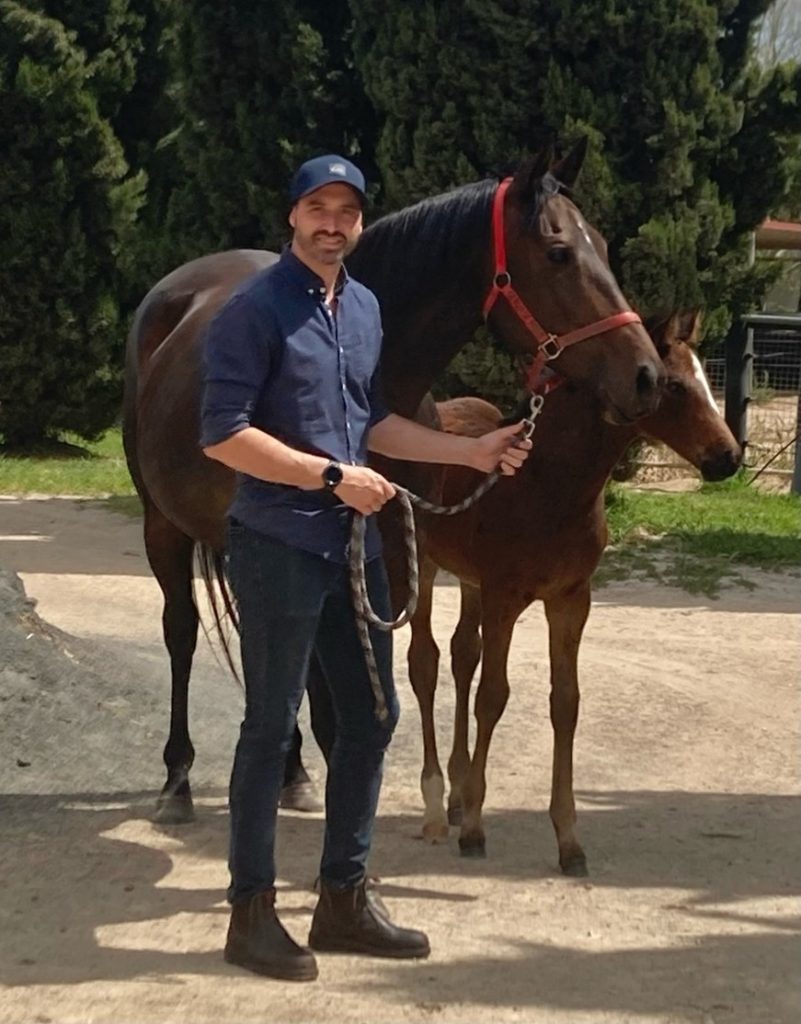 Dr Nicolas Iovenitti with a horse